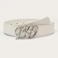 White genuine leather belt featuring a stylish metallic letter buckle for jeans and dresses. - White