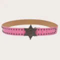 Detail view of pink y2k vintage style studded belt with cool silver metal sheriff star buckle. - Pink