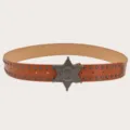 Detail shot of retro brown leather belt with silver star buckle and metallic studs. - Camel