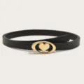 Close-up of stylish black leather belt with gold-tone oval heart metal buckle accessory. - Length 105cm Width 1.4cm / Black