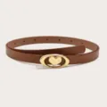 Women's brown thin leather belt with stylish gold-colored oval heart metal buckle for dress. - Length 105cm Width 1.4cm / Camel