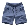 Herren Sommer wasserdichte Badeshorts lässige Strand Surf Shorts mit Reißverschlusstaschen Kordelzug. - S / Unterteile / Denim-Blau