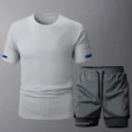 Herren Sportbekleidung Set, hellgraues T-Shirt und dunkelgraue Shorts für Fitness. - Hellgraues Oberteil Und Graue Hose
