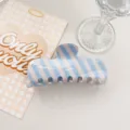 Detail view of summer fresh blue and pink striped PVC hair claw clip, minimalist shark clip. - Flat Plate Style / 9.5cm / Light Blue