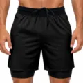 Detalle del pantalon corto deportivo negro para hombre con cordones elasticos en la cintura. - S / Negro