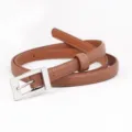 Close-up detail of the elegant brown thin leather belt with a polished silver square buckle. - Brown