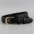 Detail view of a minimalist women's black leather belt with a shiny gold metal pin buckle. - 100cm / Black