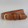 Close-up view of women's brown leather belt with classic gold metal buckle detail. - 100cm / Brown