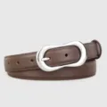 Brown leather belt detail featuring a unique silver irregular buckle and fine edge stitching. - 100cm / Coffee