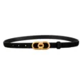 Close-up detail of a black suede belt featuring a stylish gold-toned metal knotted buckle. - Black