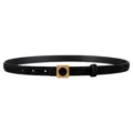 Black genuine suede leather slim belt with gold geometric square buckle detail closeup view. - Black