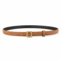 Close-up detail view of the brown suede thin belt featuring a stylish gold-tone square buckle. - Brown