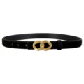 Detail view of women black suede leather belt with unique gold geometric interlocking buckle. - Black