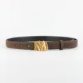 Detail shot of brown suede women belt featuring a luxury gold abstract buckle and matte texture. - 100cm / Coffee