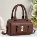 Elegant brown leather handbag for women, featuring a chic gold lock and versatile shoulder strap. - Coffee