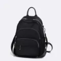 Sac à dos décontracté en nylon noir classique avec poches zippées pour voyage quotidien. - Style 4