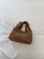 Bolso hobo marrón con nudo, elegante bolso de mano de diseño de nicho para uso diario. - Caqui