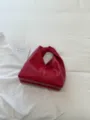 Bolso de mano de cuero anudado rojo, elegante bolso hobo minimalista para diario y fiesta. - Rojo