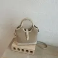 Chic beige bucket shoulder bag, stylish suede and leather handbag for daily commute. - No Pendant / Off White