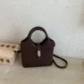 Stylish dark brown leather handbag, elegant top handle shoulder bag for women daily commute. - No Pendant / Brown