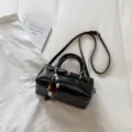 Black bowling shoulder bag for women, stylish PU leather handbag with beaded charms. - With Pendant / Black