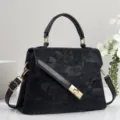 Élégant sac à main noir pour femme avec fermoir doré tendance pour un style chic quotidien. - Noir