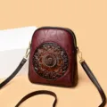 Retro embossed crossbody phone bag for women, vintage style PU leather shoulder bag with floral pattern. - Burgundy