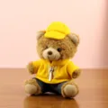 Cute plush teddy bear pendant with yellow jacket and cap, soft stuffed animal car decoration. - 13cm / Yellow
