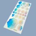 Holografischer Gesichtssticker Bogen mit Sonne, Mond und Sternen für Festival Make-up und Party. - Himmelskörper Stil (S2-26001)