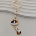 Cute calico cat metal keychain with big face and tail pendant, creative bag charm for women and girls. - Calico Cat Style (4)