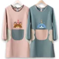 Long sleeve waterproof kitchen apron with wipeable hand towels and cute cartoon print. - Lake Blue & Lotus Pink