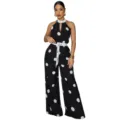Schicker schwarz-weißer Pünktchen-Halterless-Jumpsuit, ärmellos mit Taillenband für Damen. - S / Set / Schwarz