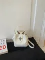 White litchi pattern leather bucket bag minimalist commute handbag with metal lock strap - No Pendant / White