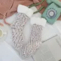 Cozy thick fuzzy winter thermal sleep socks for women with soft plush fleece cuffs and pretty bow. - One Size / Meteorite Gray