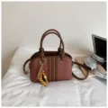 Canvas patchwork handbag for women, stylish tote bag with top handle and chic bead charm. - With Pendant / Brown