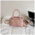 Pink canvas crossbody handbag for women, stylish commuting tote bag with top handles and strap. - No Pendant / Pink