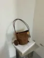 Brown suede bucket bag with coin purse and flower charm, chic retro shoulder handbag for women. - With Pendant / Brown