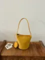 Stylish autumn yellow suede bucket bag for women, vintage shoulder bag with small coin purse. - With Pendant / Yellow