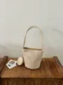 Minimalist suede bucket bag for women, chic shoulder handbag with small coin pouch. - With Pendant / Apricot