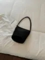 Black suede bucket bag for women, chic retro shoulder handbag with slim straps and solid round base. - No Pendant / Black