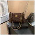 Dark brown quilted chain shoulder bag for women, elegant commuter crossbody handbag with metal strap. - Round Lock Style / Coffee
