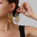 Retro rhinestone hollow long tassel earrings, bohemian style ethnic dangle jewelry detail shot. - Petal Tassel Style (weh6388) / Red Antique Gold