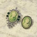 Vintage cameo brooch set with green stones and rhinestones, elegant Victorian palace style accessory. - Silver-Green