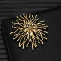 Close-up of exquisite gold alloy abstract branch brooch detail, showcasing fine metallic texture. - Abstract Branch Shape (X1175)