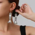 Close-up detail of vintage silver square crystal jhumka earrings with ethnic tassels. - Square Rhinestone Tassel Style (weh6384) / White Antique Silver