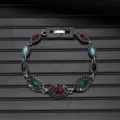 Detailed shot of vintage multi-stone bracelet showing intricate retro metalwork and vivid gems. - Vintage Style L740-11