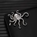 Exquisite alloy octopus brooch featuring a baroque pearl and crystal inlay, detail close-up view. - Octopus Shape (X1176-1)