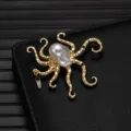 Detailed view of gold octopus brooch showcasing baroque pearl head and crystal pendant. - Octopus Shape (X1176)