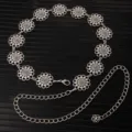 Detailed view of the silver metal flower waist chain, showing the intricate carved floral links. - X1198-1 (Silver)