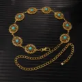 Close-up detail of vintage gold waist chain featuring intricate floral hollow filigree and blue stones. - X1200 (Gold)